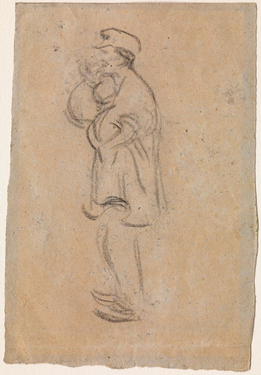 Home amb brusa i gorra