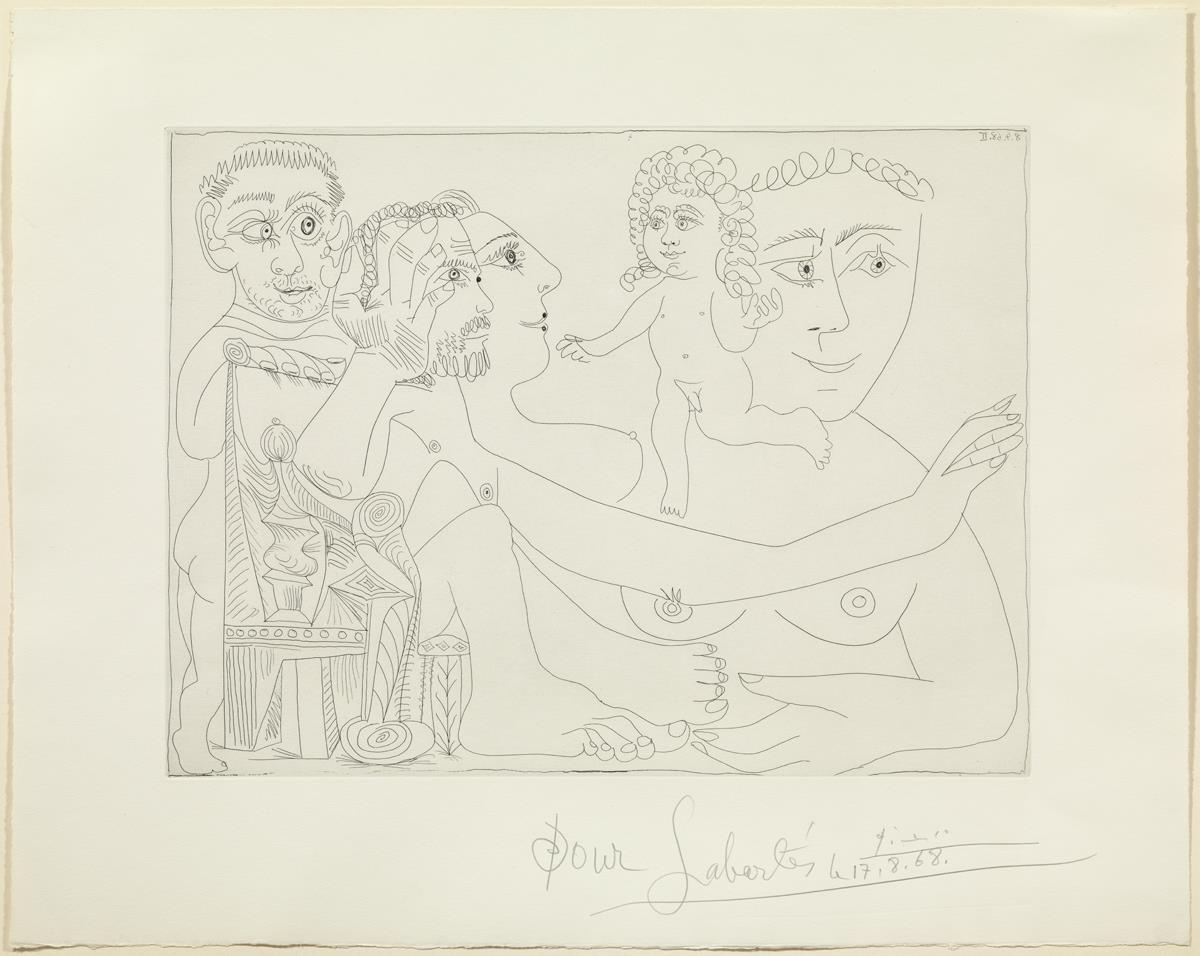 Grup amb home assegut en una cadira de poms i balustres pensant en l'amor