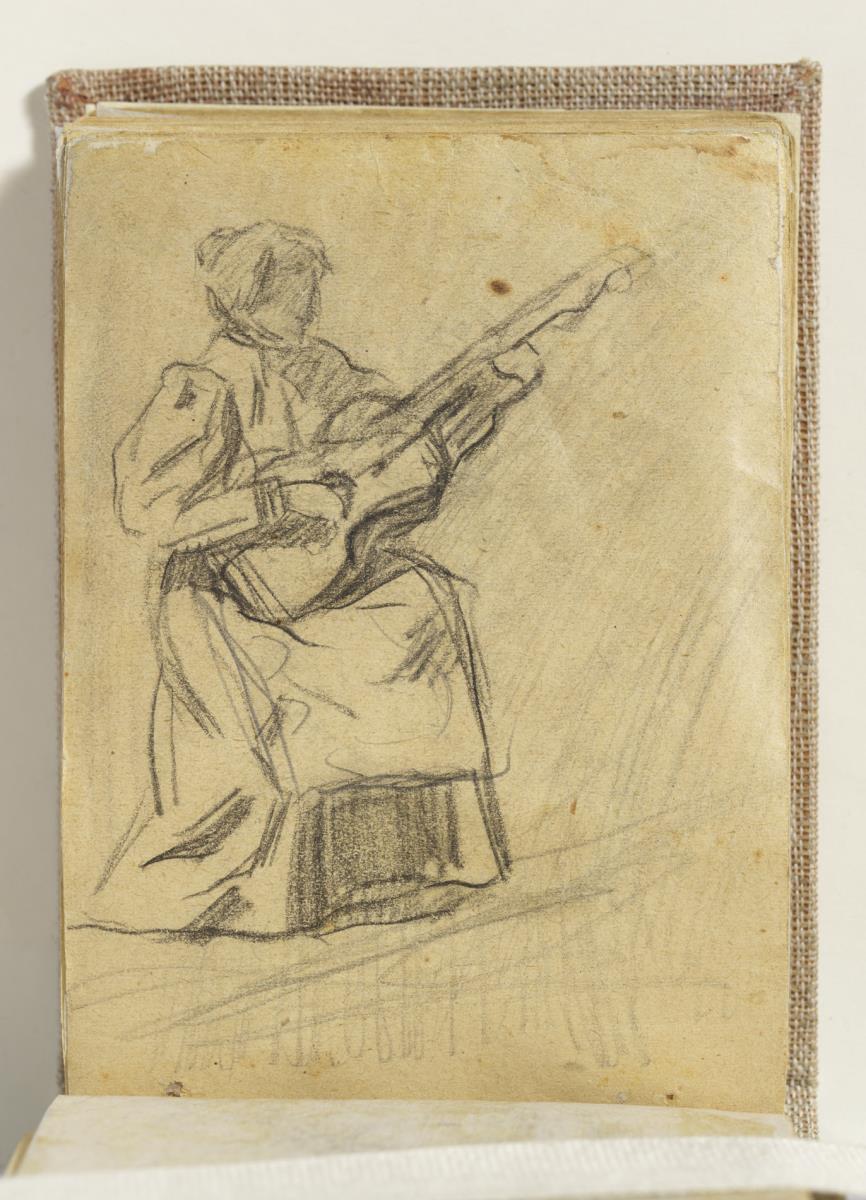 Mujer tocando la guitarra