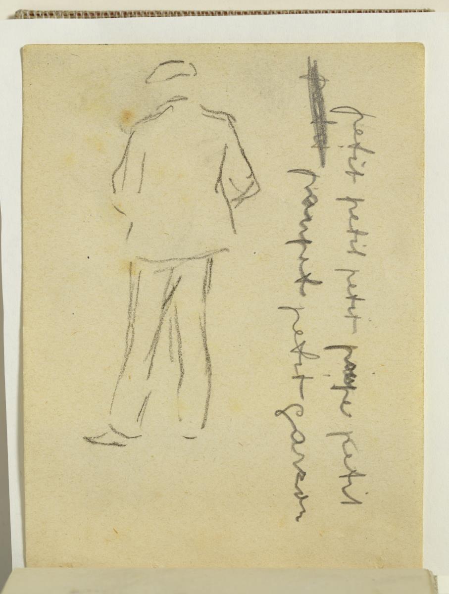 Hombre de espaldas y anotaciones manuscritas