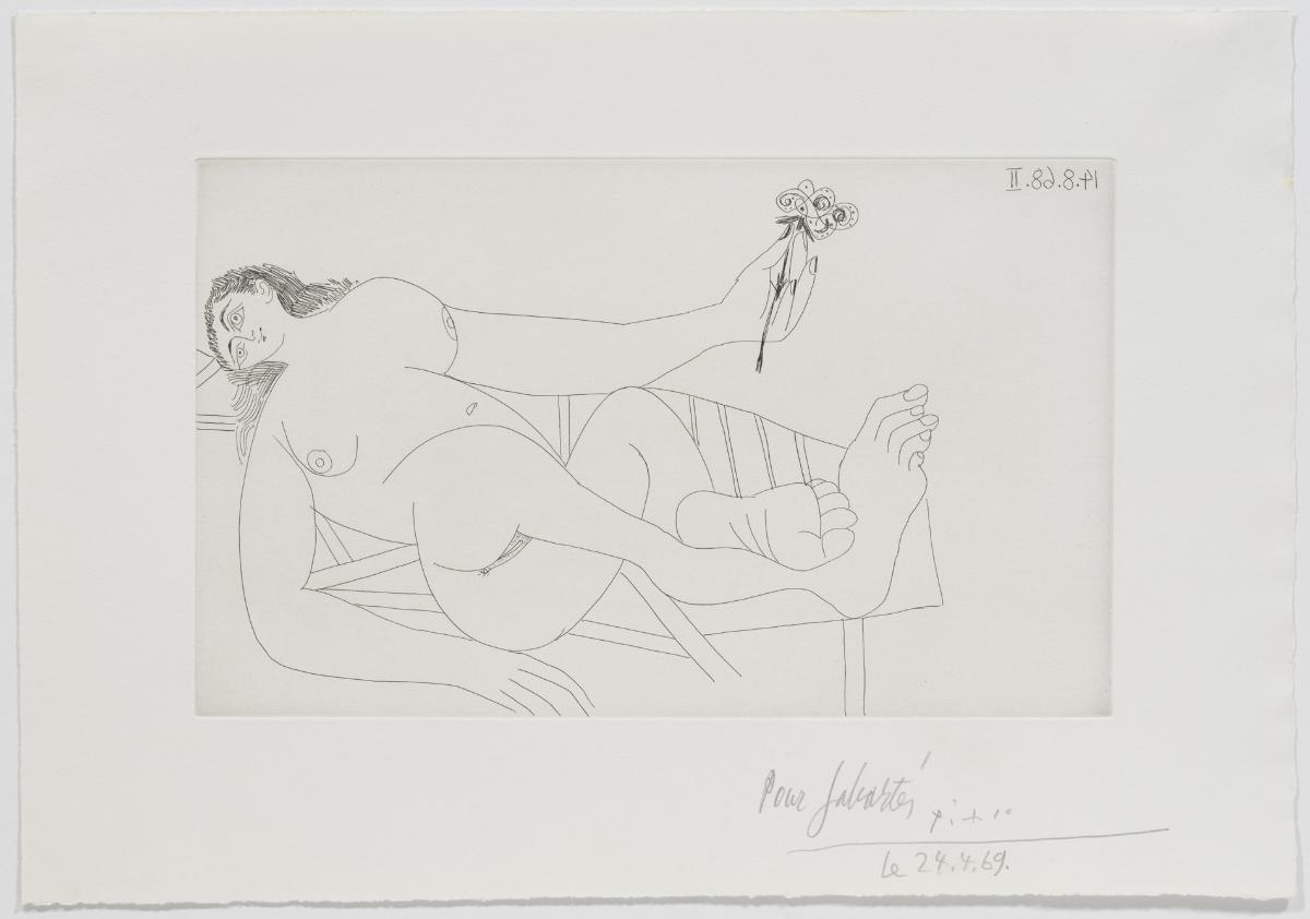 Woman with Flower on a Lounger