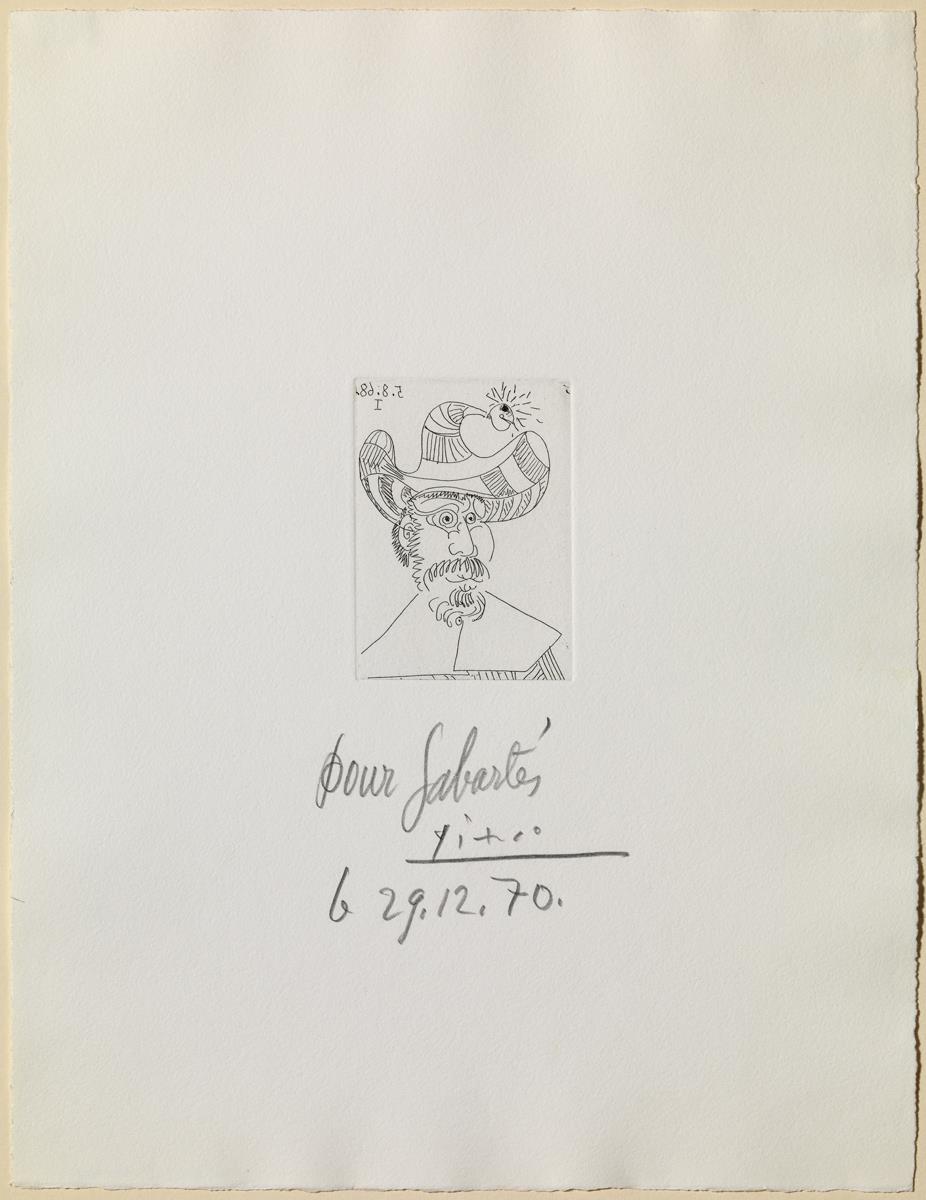 Barbut amb un barret guarnit amb un picarol