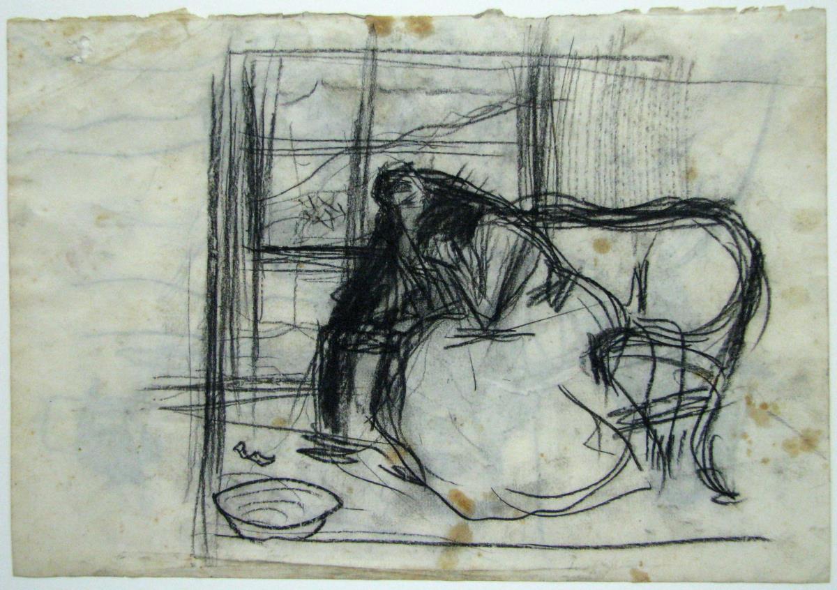 Parella asseguda en un sofà