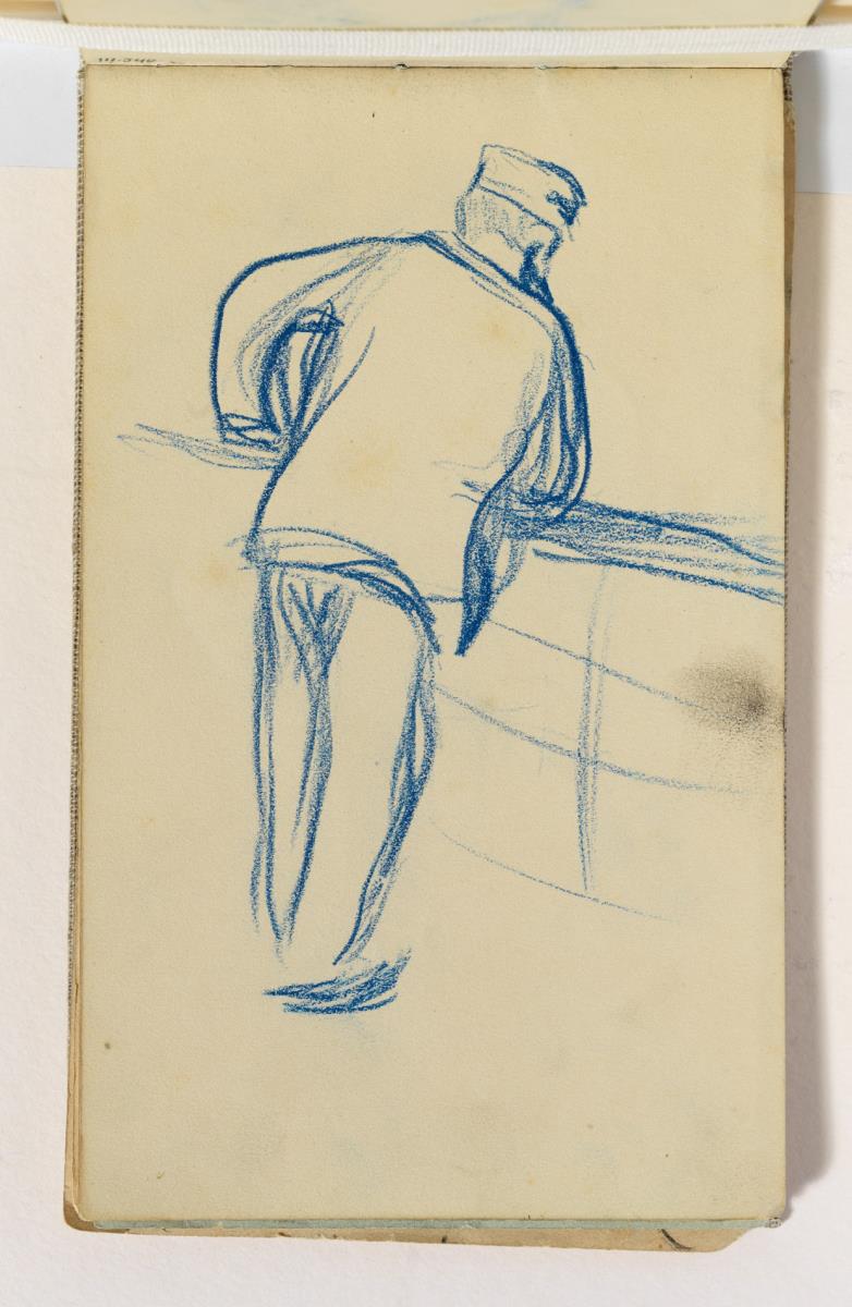 Hombre acodado en una barandilla