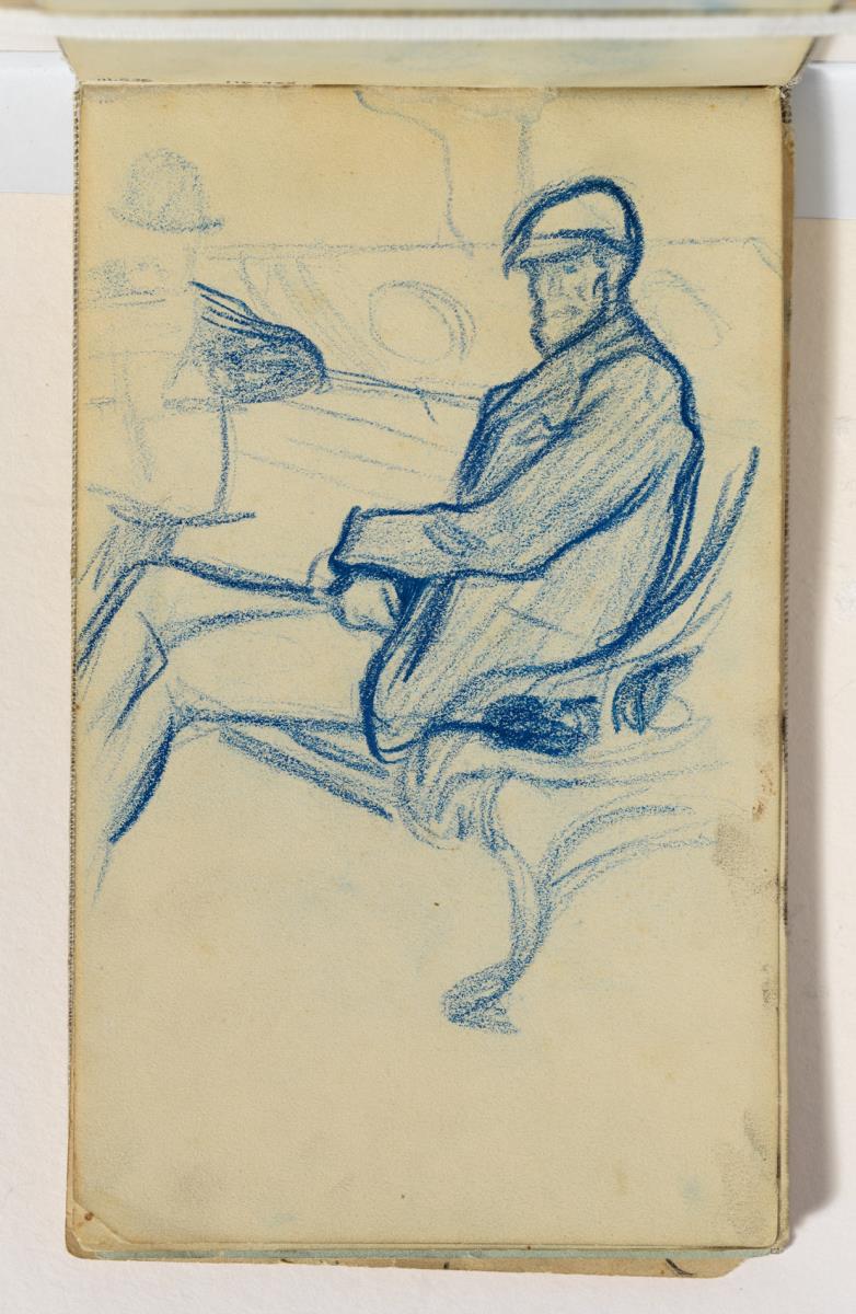 Hombre sentado en un banco