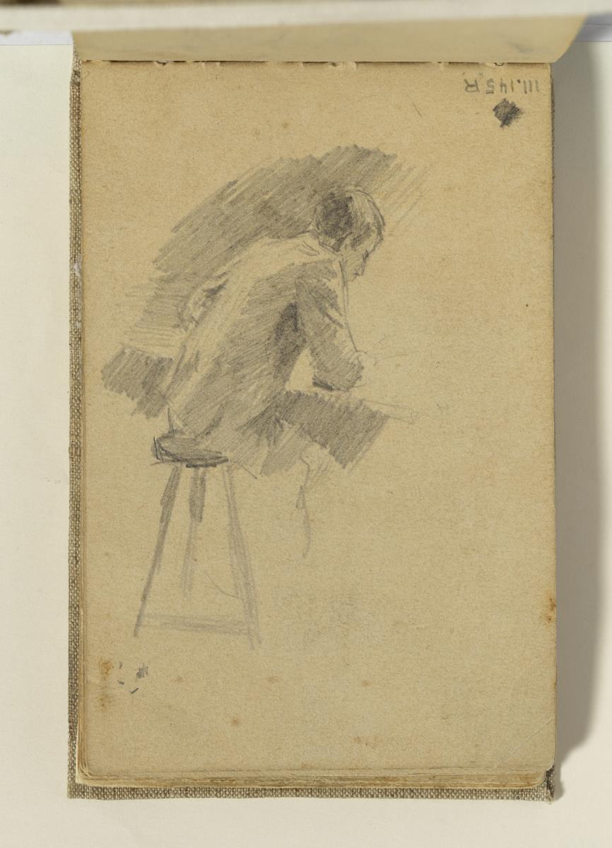 Home recolzat sobre una taula