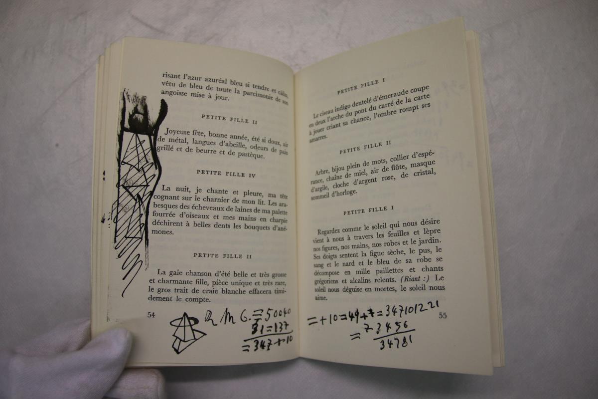 Dibujos geométricos y anotaciones manuscritas